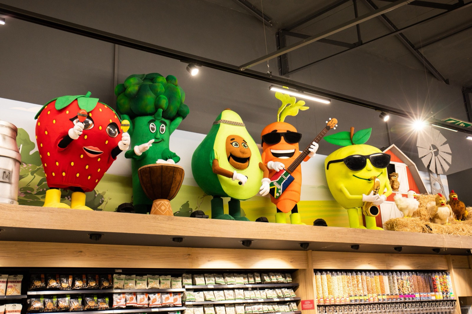 Food Lover's Market mascots above the produce hall