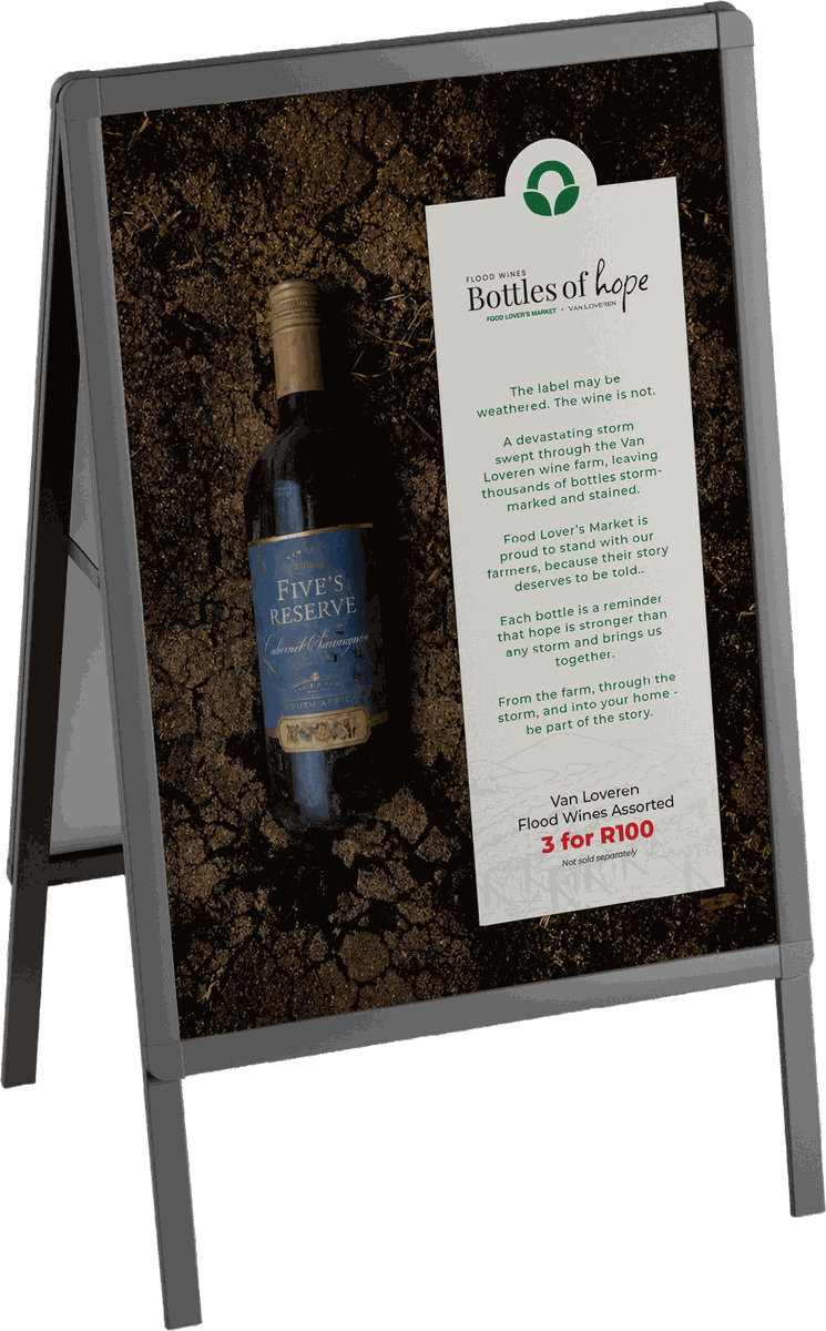 Bottles of Hope sandwich frame, bottle in the flood mud